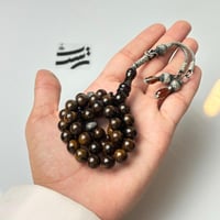 سبحة فاتوران بني معرق - طربزون مع فواصل فضة عيار 1...