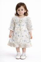 فستان بناتي ناعم بلون أوف وايت مزين بورود زرقاء وي...