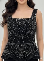 فستان سهرة أسود طويل بتطريز فاخر ولمسات لامعة جذاب...