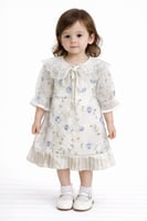 فستان بناتي ناعم بلون أوف وايت مزين بورود زرقاء وي...