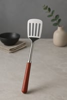 ملعقة تقليب ستانلس ستيل بمقبض خشبي أنيق