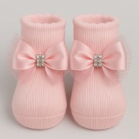 جوارب مواليد وردية بفيونكة ساتان وكريستالات لامعة