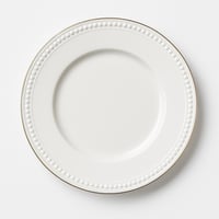 صحن بورسلان فاخر بتصميم لؤلؤي وحواف ذهبية