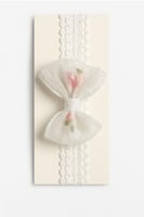 ربطة رأس مواليد دانتيل بفيونكة شفافة أنيقة