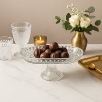 صحن تقديم زجاجي فاخر بقاعدة مرتفعة – تصميم بيضاوي