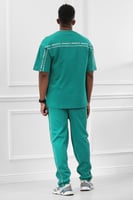 طقم رجالي صيفي كاجوال اوفر سايز مكون من تيشرت و بن...