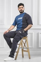 طقم رجالي صيفي كاجوال اوفر سايز تيشرت بشعار تورنز...