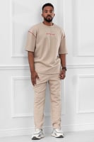 طقم رجالي صيفي كاجوال اوفر سايز مكون من تيشرت و بن...