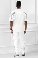 طقم رجالي صيفي كاجوال اوفر سايز مكون من تيشرت و بن...