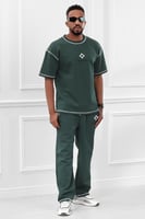 طقم رجالي صيفي كاجوال اوفر سايز مكون من تيشرت و بن...