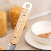 مغرفة من الفولاذ المقاوم للصدأ بمقبض خشبي فضي/بني