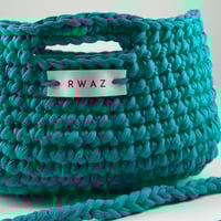 حقيبة يد لون واحد