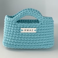 حقيبة يد مسكتين لون واحد