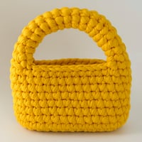 حقيبة يد مسكة واحدة لون واحد