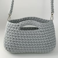 حقيبة يد لون واحد