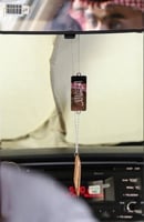 تعليقة سيارة بالاسم