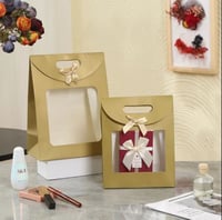 اكياس فاخرة بنافذة وفيونكه