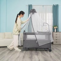 سرير ومحبس اطفال بناموسية وألعاب + طاولة تغيير