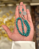 سبحة عقيق برازيلي زيتي مطعن بعروق