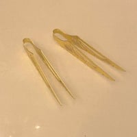 ملقاط الثلج او البخور والفحم