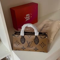 OnTheGo East West Chain Lv bag