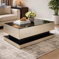 طاولة قهوة مودرن مستطيلة بسطح زجاجي وقاعدة أنيقة