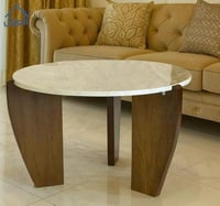 طاولة قهوة دائرية سطح بديل رخام وقاعدة خشب أنيقة