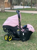 كرسي سيارة مع عربة 4 في 1 ( وردي )