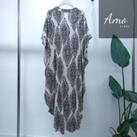 فستان لون سكري بنقشات أسود مقاس واسع بزراير أمامية...