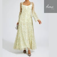 فستان ماكسي لون أصفر مشجر تصميم كلاسيك يظهر جمالك...