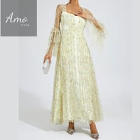 فستان ماكسي لون أصفر مشجر تصميم كلاسيك يظهر جمالك...