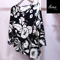 بلوزة واسعة خامة ناعمة مشجرة بياقة دائرية الأكمام...