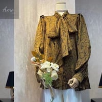 بلوزة مشجرة بزراير أمامية بكرافت مقاسها كبير MABL3...