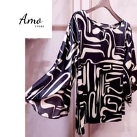 بلوزة واسعة خامة ناعمة مشجرة بياقة دائرية الأكمام...