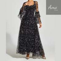 فستان ماكسي لون أسود مشجر تصميم كلاسيك يظهر جمالك...