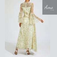 فستان ماكسي لون أصفر مشجر تصميم كلاسيك يظهر جمالك...