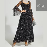 فستان ماكسي لون أسود مشجر تصميم كلاسيك يظهر جمالك...