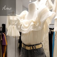 بلوزة ناعمة أوف شولدر او علاقي مزينة بحبات اللولوء...