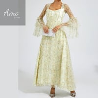 فستان ماكسي لون أصفر مشجر تصميم كلاسيك يظهر جمالك...