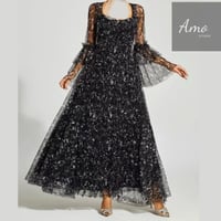 فستان ماكسي لون أسود مشجر تصميم كلاسيك يظهر جمالك...