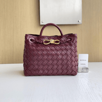 شنطة بوتيغا فينيتا لون برغندي مشبك ذهبي الحجم الصغ...