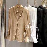 بلوزة انيقة ناعمة بأكمام طويلة ,الياقة بأزرار لؤلؤ...