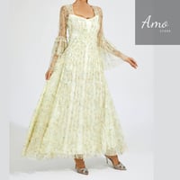 فستان ماكسي لون أصفر مشجر تصميم كلاسيك يظهر جمالك...