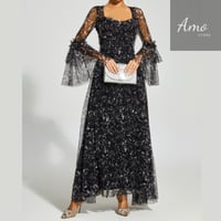 فستان ماكسي لون أسود مشجر تصميم كلاسيك يظهر جمالك...