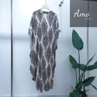 فستان لون سكري بنقشات أسود مقاس واسع بزراير أمامية...