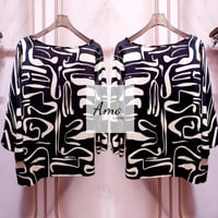 بلوزة واسعة خامة ناعمة مشجرة بياقة دائرية الأكمام...