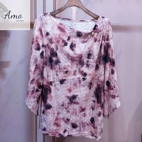 بلوزة واسعة خامة ناعمة مشجرة بياقة دائرية مع بروش...