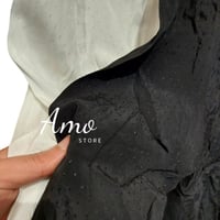 بلوزة بطابع عصري أكمام طويلة بزيادة من الصدر كراف...