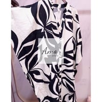 فستان فضفاض مقاس واسع بزراير أمامية من الآعلى الى...