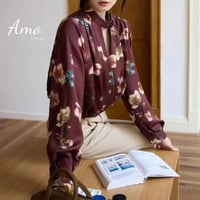 بلوزة لون احمر برغندي مشجر ب درابي مخصر و ياقة لف...